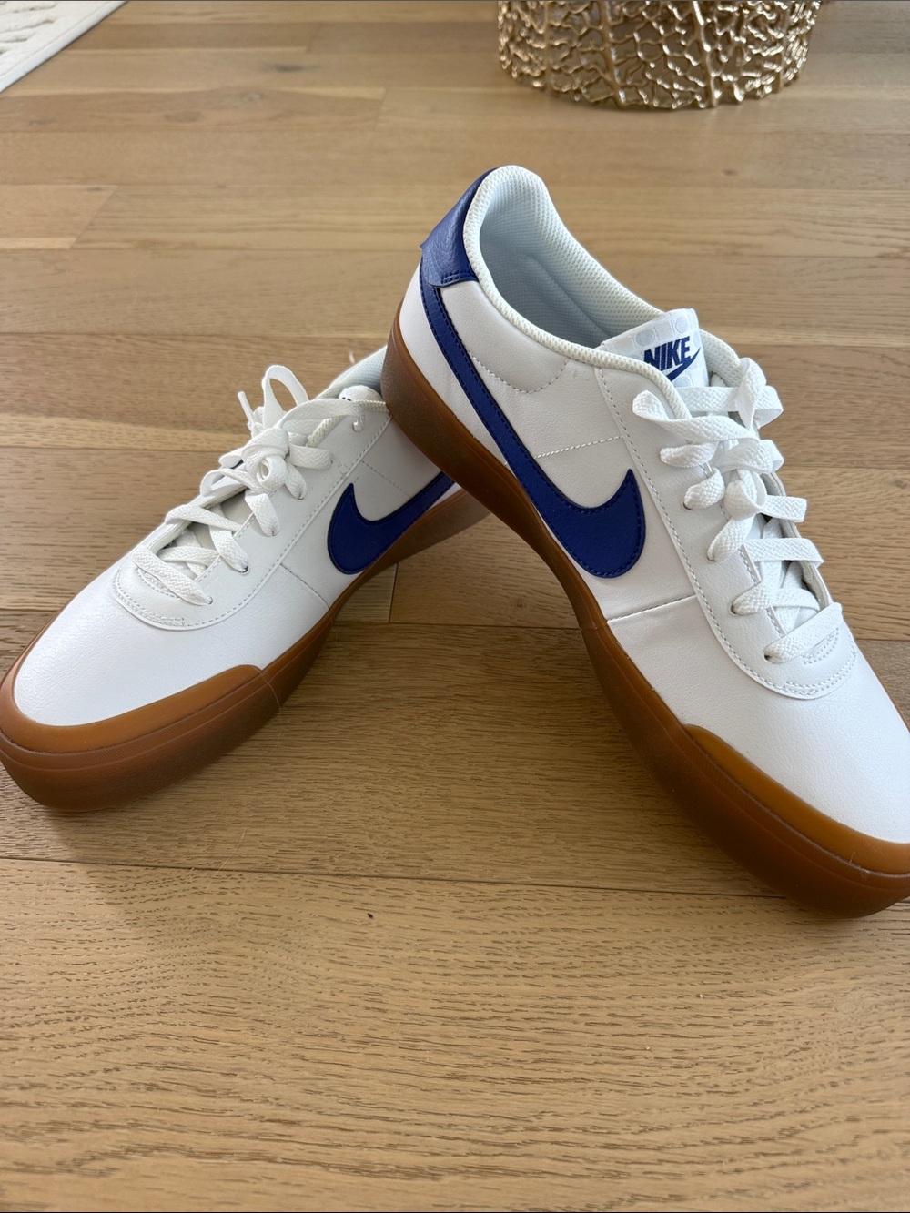 Nike Men’s White Sneakers with Blue Swoosh and Gum Sole
